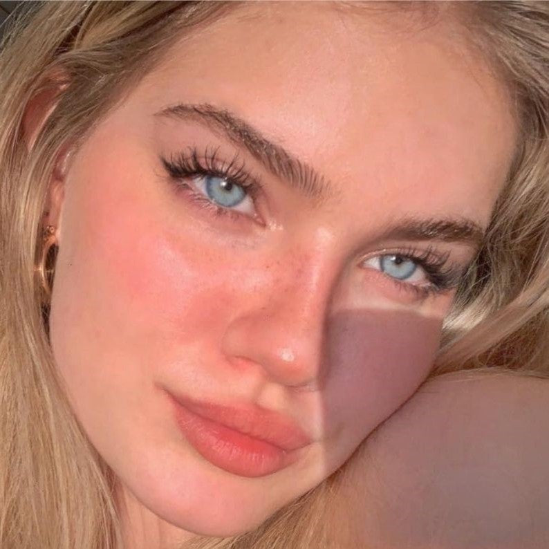 Beautiful Woman Wearing Rhone Blue Colored Contact Lenses
